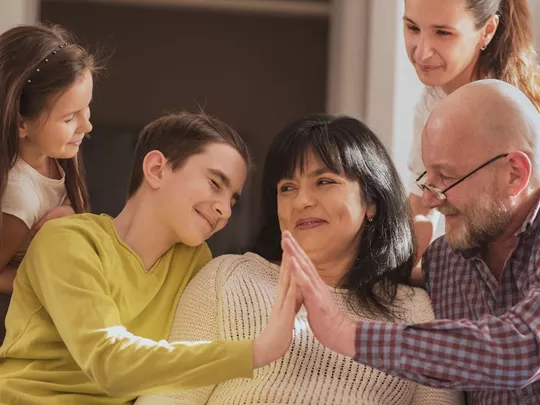 autistic foster child with birth children